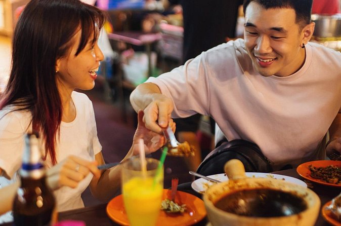 3-Hour Private Street Food Walking Tour in Kuala Lumpur - A famous food street with satay and grilled seafood