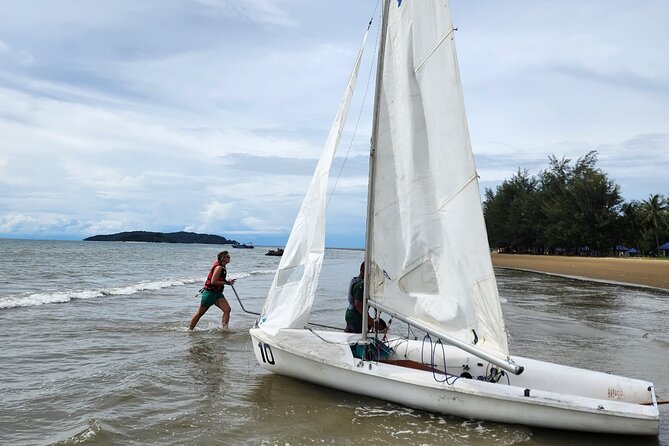 Discover Sailing Experience in Tanjung Aru Beach - Taking the controls on the South China Sea