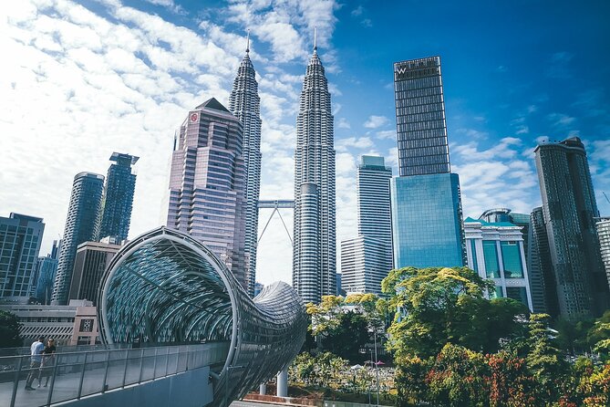 Kuala Lumpur Airport Transit Tour - Petronas and KL Tower: two views of modern Kuala Lumpur