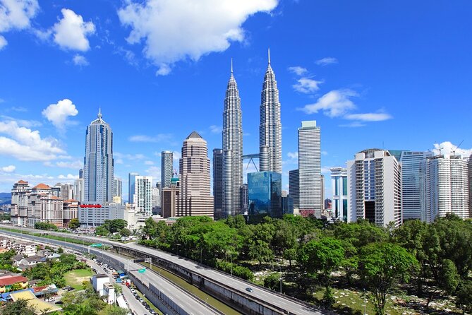 Kuala Lumpur City Tour plus Batu Caves, Hot Springs & Waterfalls - Jadi Batek and traditional Malaysian batik