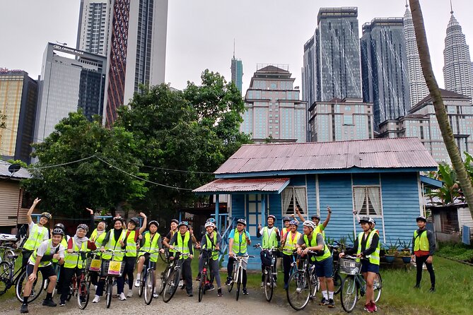 Kuala Lumpur Sunset Evening Cycling Tour - Petaling Street begins the ride with lights and murals
