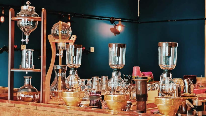 Kuching: Foodie Experience Guided Tour with 5 Tastings - A Covered Walkway and a Bowl of Porridge