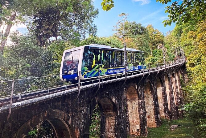 Penang Full Day Tour with Penang Hill, Kek Lok Si & Fruit Farm - Batu Ferringhi, Penang’s first coastal stop