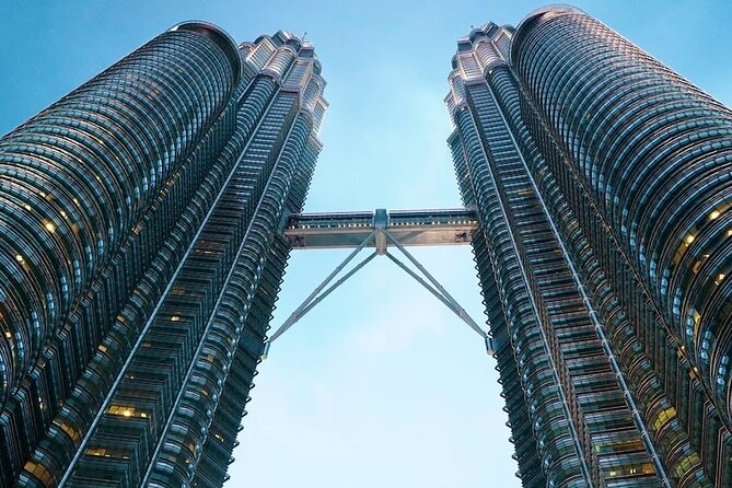 Petronas Twin Tower Skybridge View & Dining Experience Tour with Local Host - Meeting your host near the towers