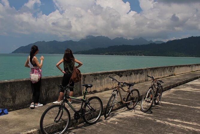 Private Half Day Cycling Tour in Langkawi - Kuala Teriang: fishing boats and water views