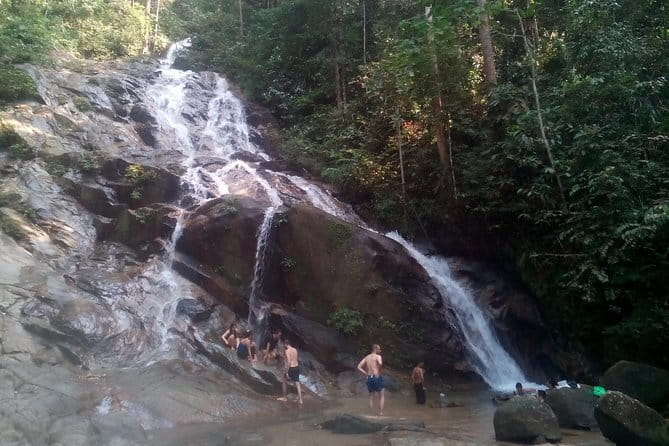 Rainforest-Cascading Waterfall & Batu Cave (Private Tour) - Batu Caves: limestone, color, and religious etiquette