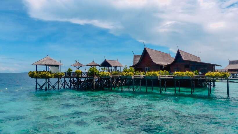 Semporna: Mabul and Kapalai Trip in Snorkel or Dive & Lunch - Mabul’s water village is the first major stop