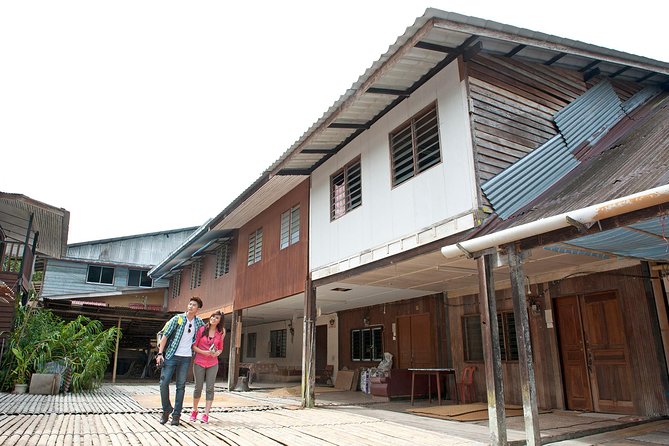 Traditional Bidayuh Village Bamboo Longhouse Tour - Entering a traditional bamboo longhouse