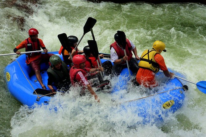 Water Rafting Adventure at Ulu Slim (from KL) - Calm water, river scenery, and a waterfall