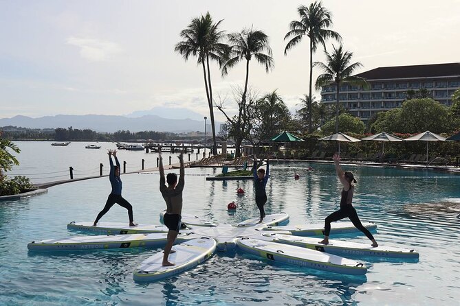 Zen & Splash: Stand-Up Paddleboard (SUP) Yoga in Tanjung Aru - Seated poses create a calm beginning