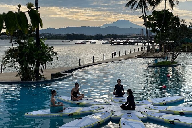 Zen & Splash: Stand-Up Paddleboard (SUP) Yoga in Tanjung Aru - Kneeling positions test your core and alignment