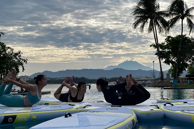 Zen & Splash: Stand-Up Paddleboard (SUP) Yoga in Tanjung Aru - Cooling down with the water beneath you