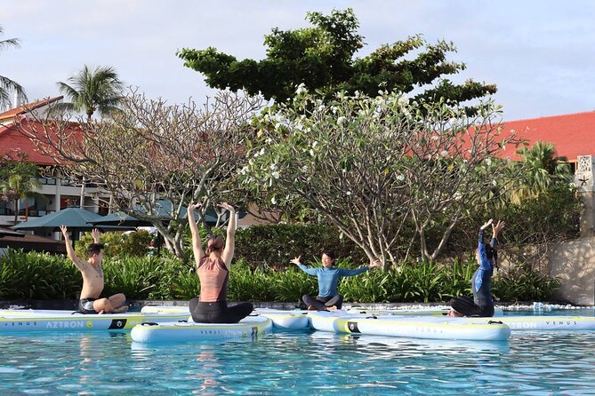 Zen & Splash: Stand-Up Paddleboard (SUP) Yoga in Tanjung Aru - Trading your yoga mat for a floating board